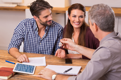 Family closing on their first home