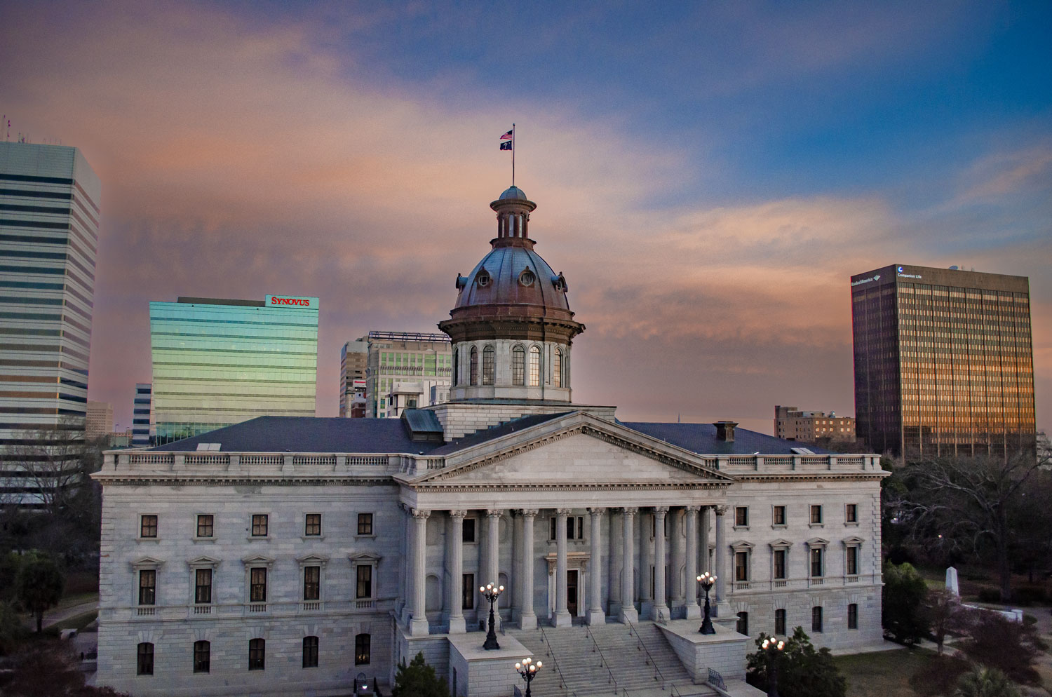 South Carolina State House with morning clouds in the background.